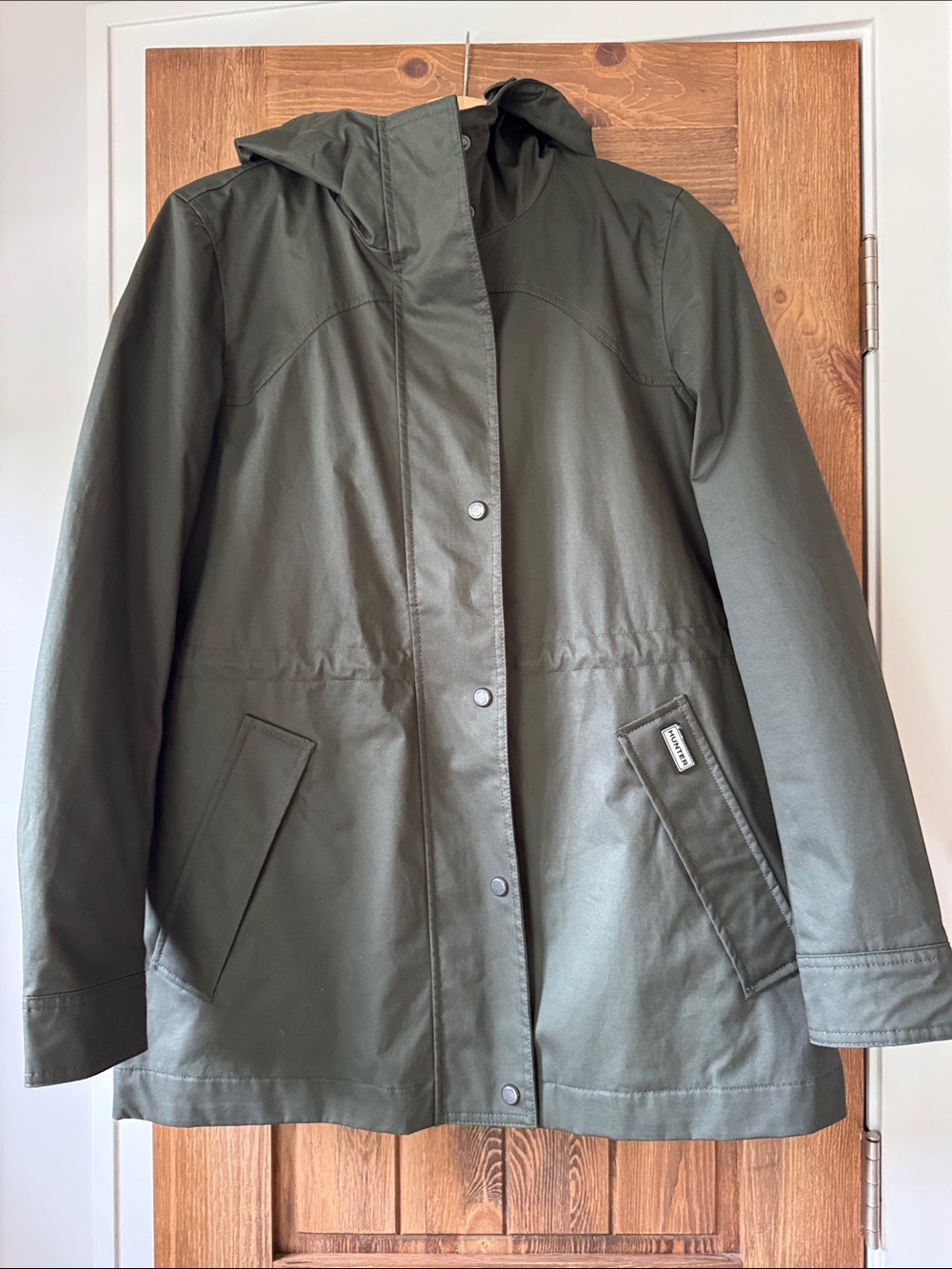 Hunter women’s olive green rain coat.